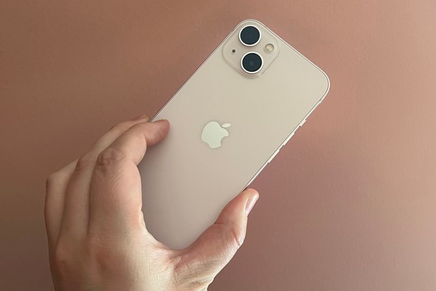iPhone 13 rear hand iPhone 13 in hand